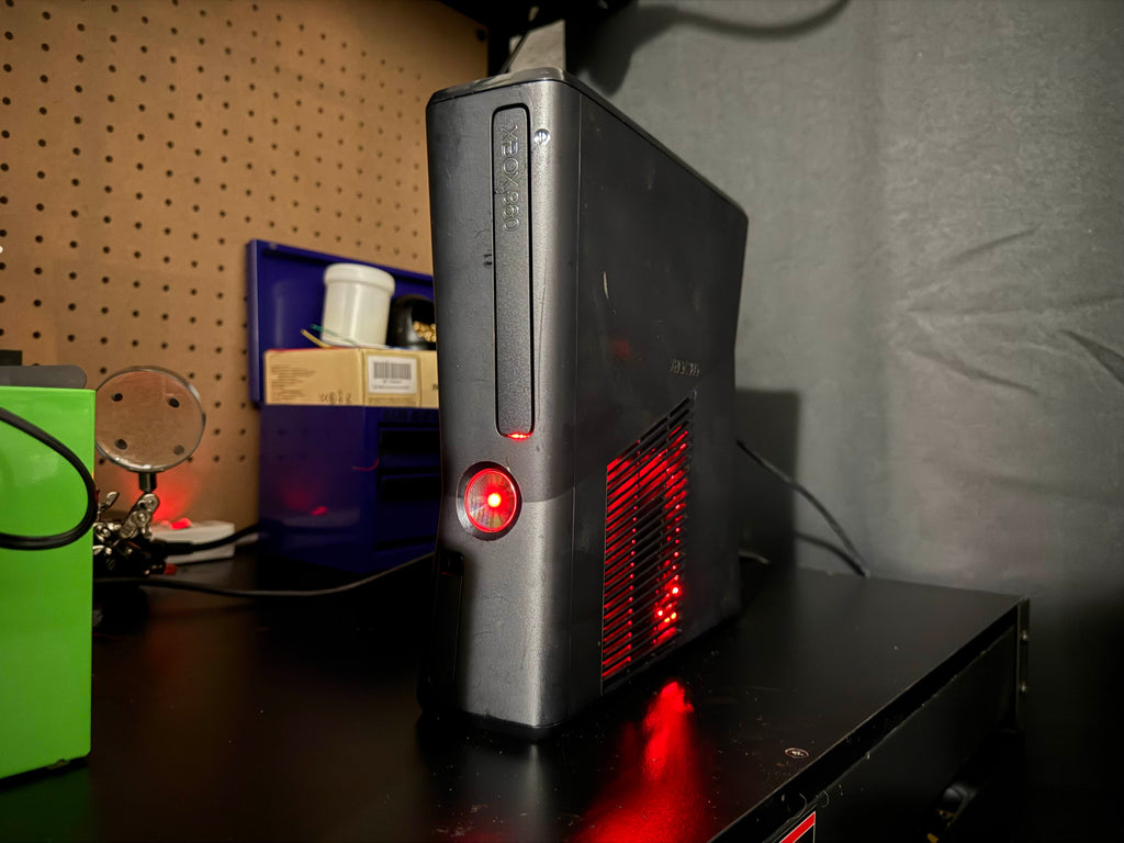 RGH3 Xbox 360 Slim Corona modded console with red LEDs